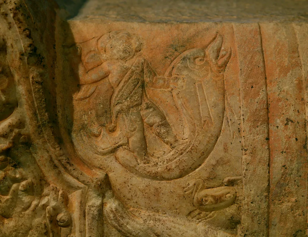 : detail of a dolphin, rider, and sneaky crab, Ioannina