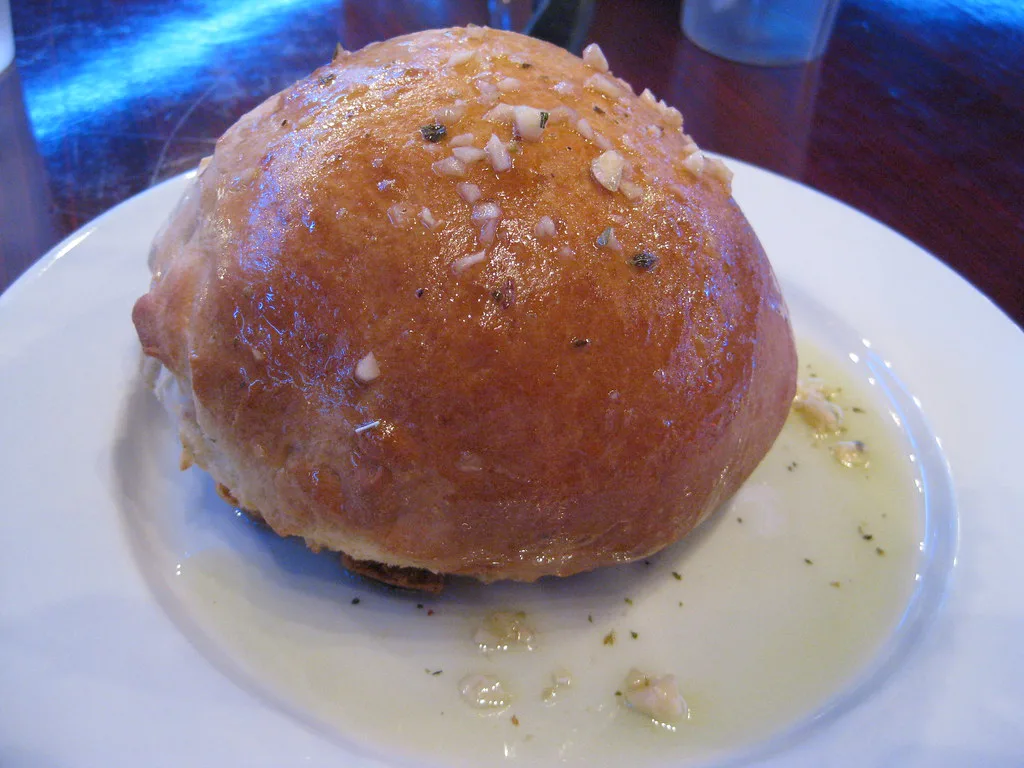 Plate-sized, garlic-covered Sally Lunn boule at Mykonos Taverna